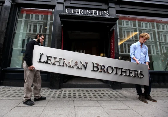 Two-employees-of-Christies-auction-house-maneuver-the-collapsed-investment-bank-Lehman-Brothers